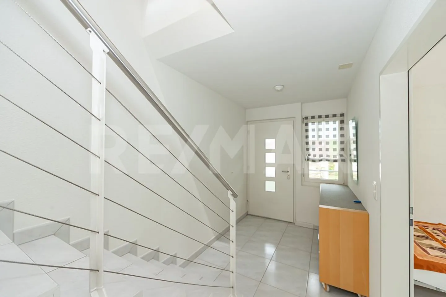 Appartement en duplex de 5,5 pièces dans un emplacement résidentiel attrayant - Photo 3 sur 13