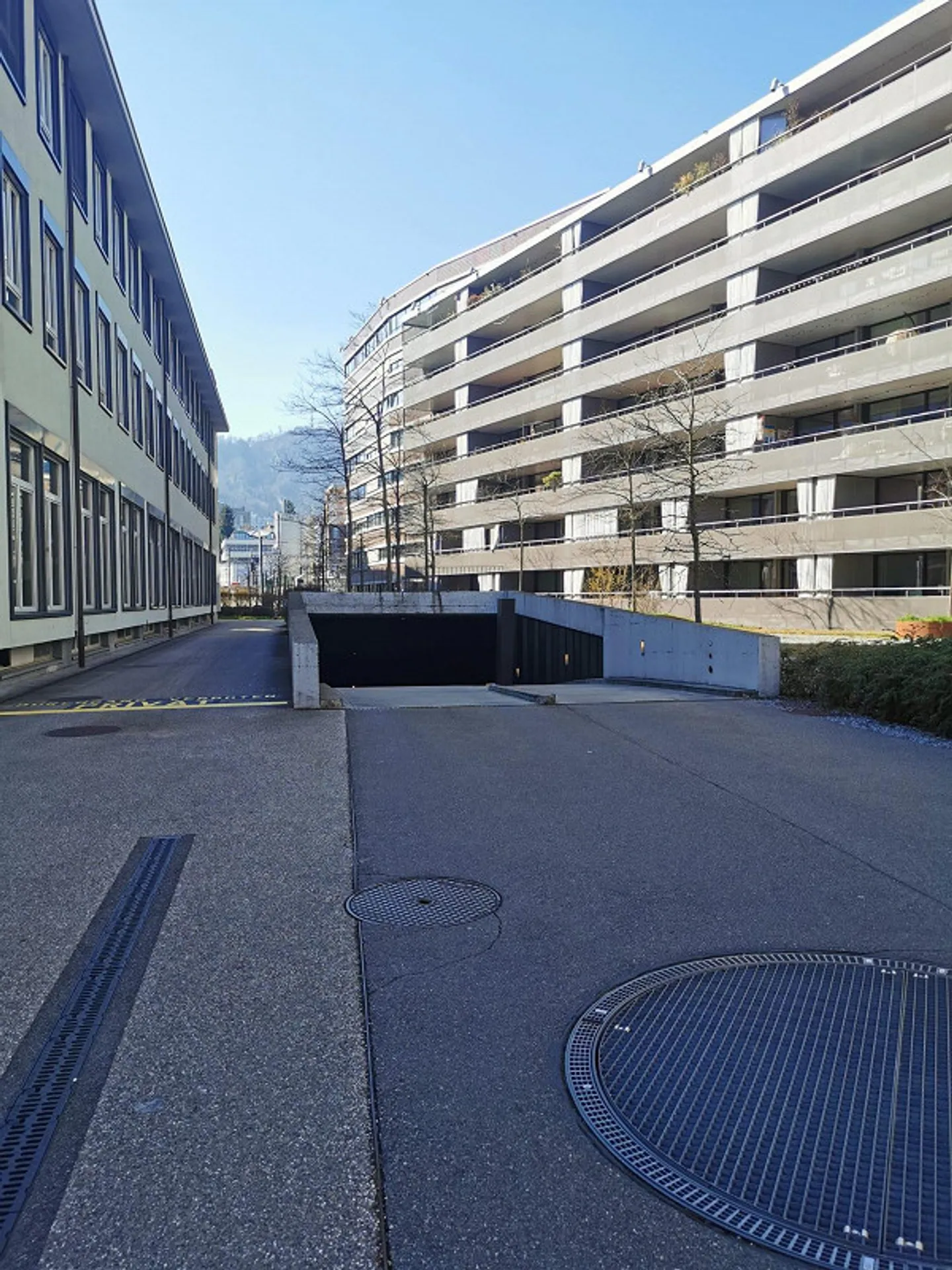 Parking space with electric charging station - Photo 1 of 3
