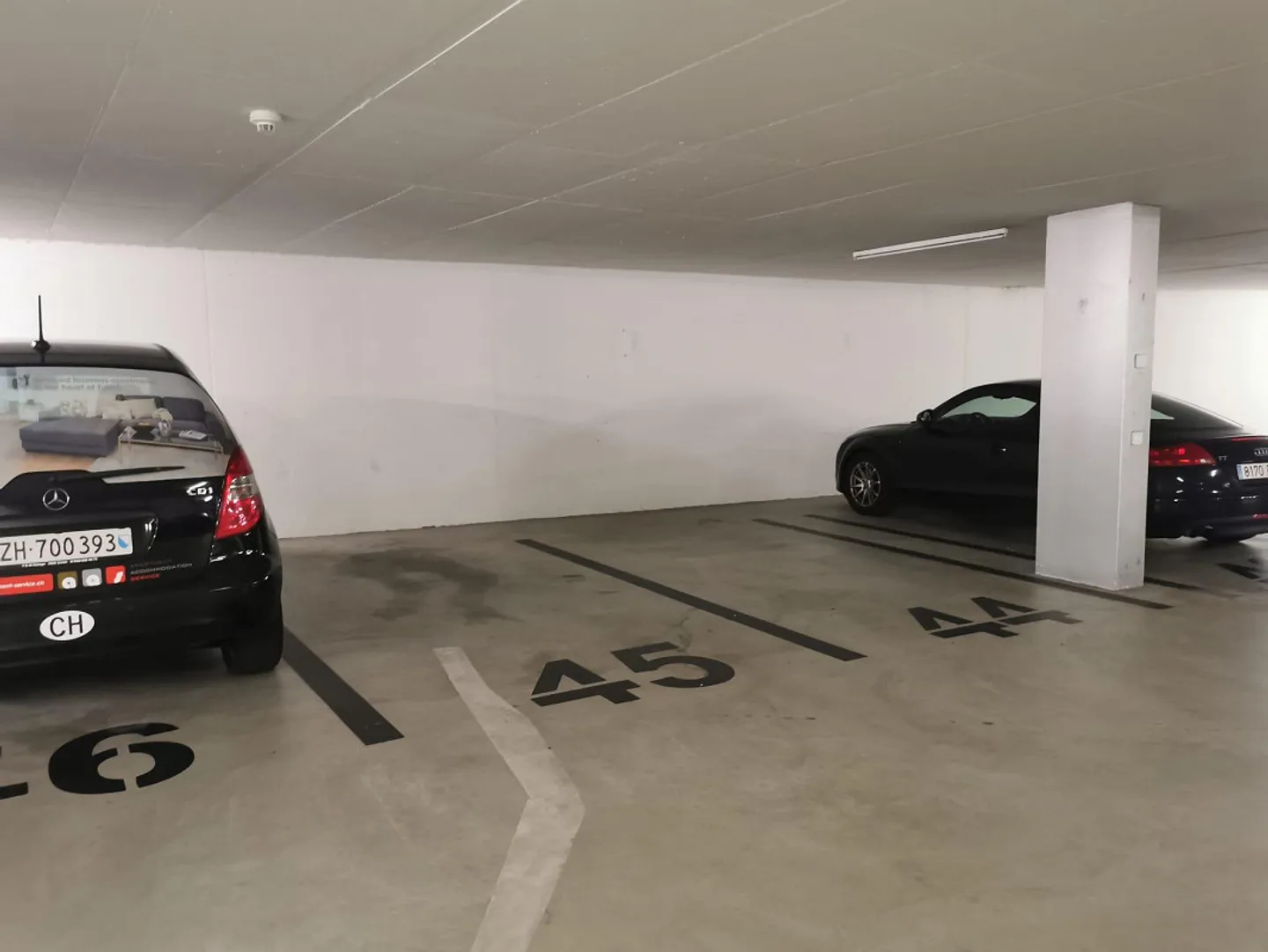 Parking space with electric charging station - Photo 2 of 3