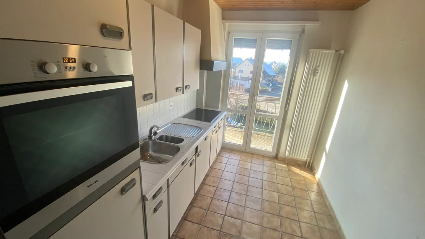 2,5-Zimmer-Wohnung in Vendlincourt mit großem Gemeinschaftsgarten - Foto 2 von 18