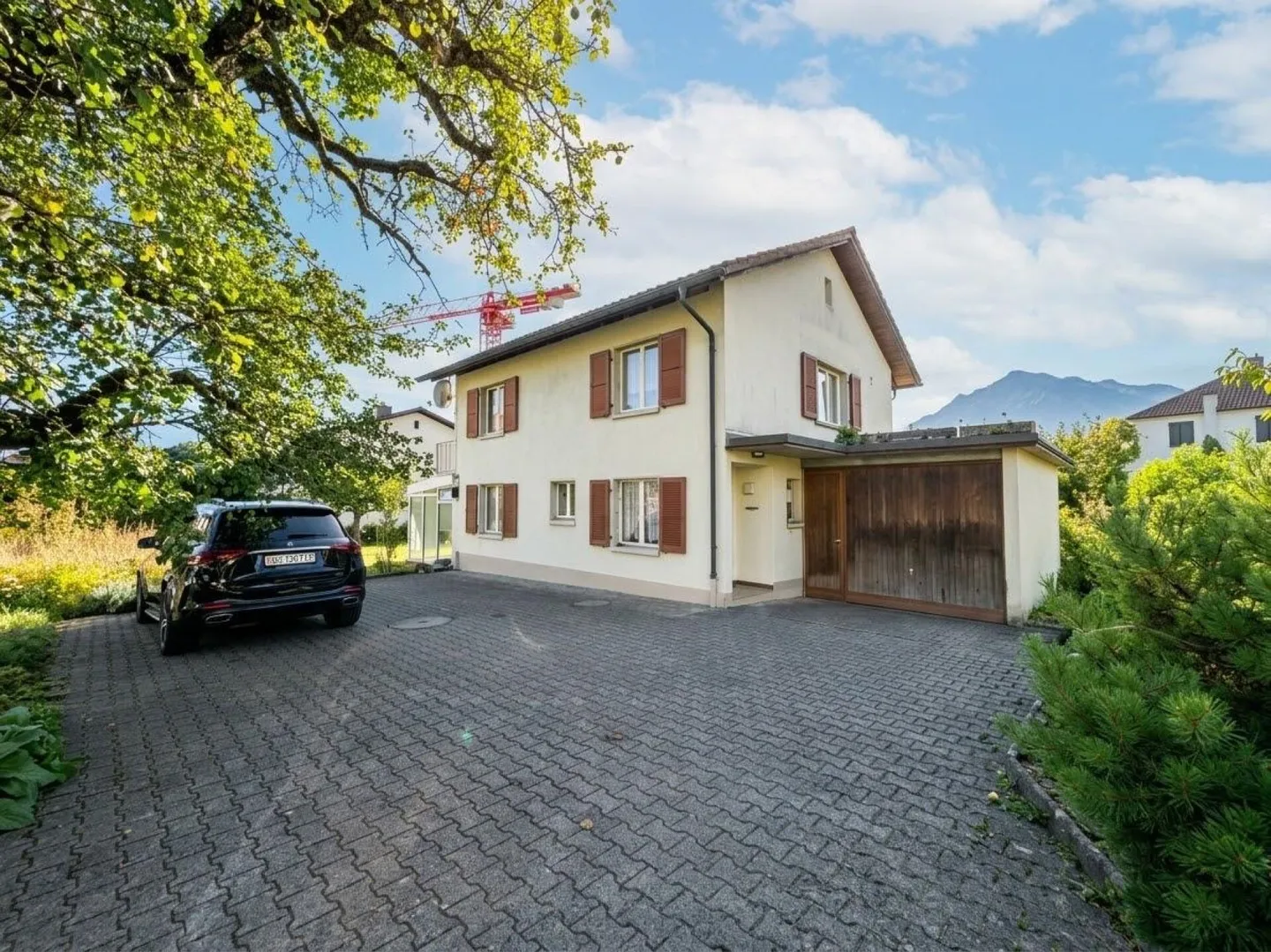 Charming Single-Family Home by the Stream with Conservatory and Garage - Photo 1 of 12