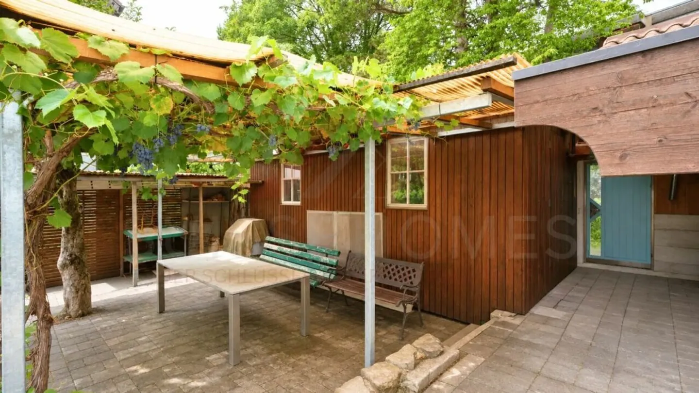 Vielseitiges Mehrfamilienhaus mit drei Wohneinheiten und attraktiven Gewerbeflächen - Photo 20 of 22
