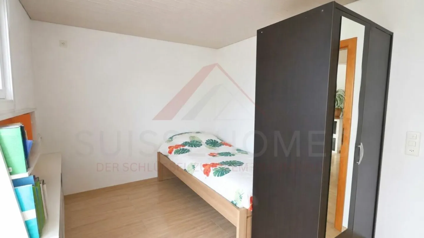 Vielseitiges Mehrfamilienhaus mit drei Wohneinheiten und attraktiven Gewerbeflächen - Photo 12 of 22