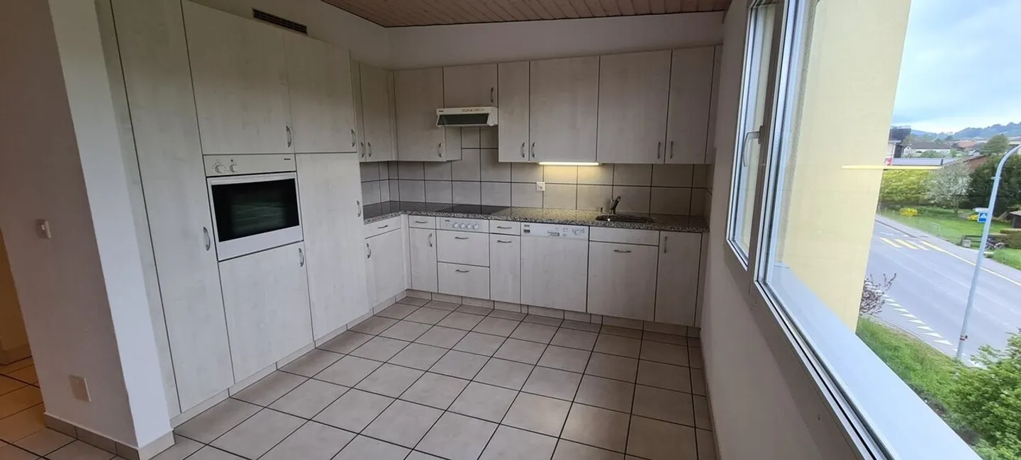 Charmant 3.5 pièces avec balcon dans un quartier très familial - Photo 3 of 11