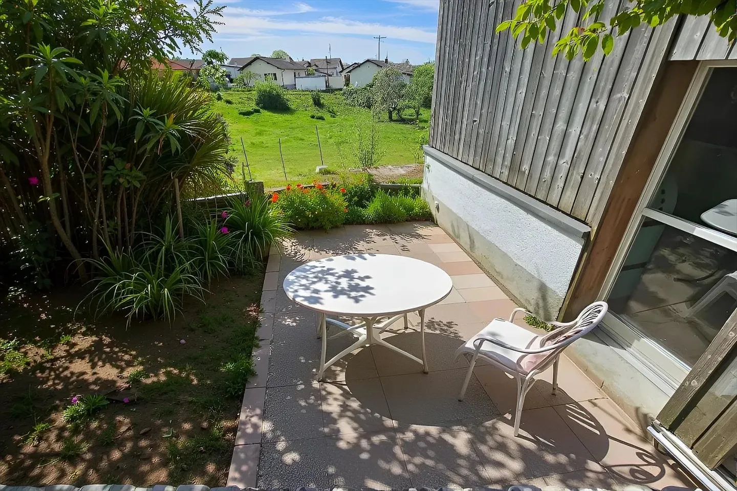 «Ein charmantes Triplex mit Garten» - Foto 2 von 13