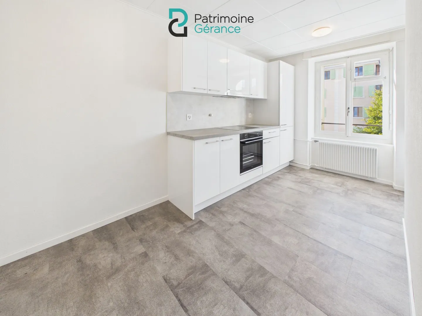 Appartement rénové à La Chaux-de-Fonds - Photo 1 sur 10