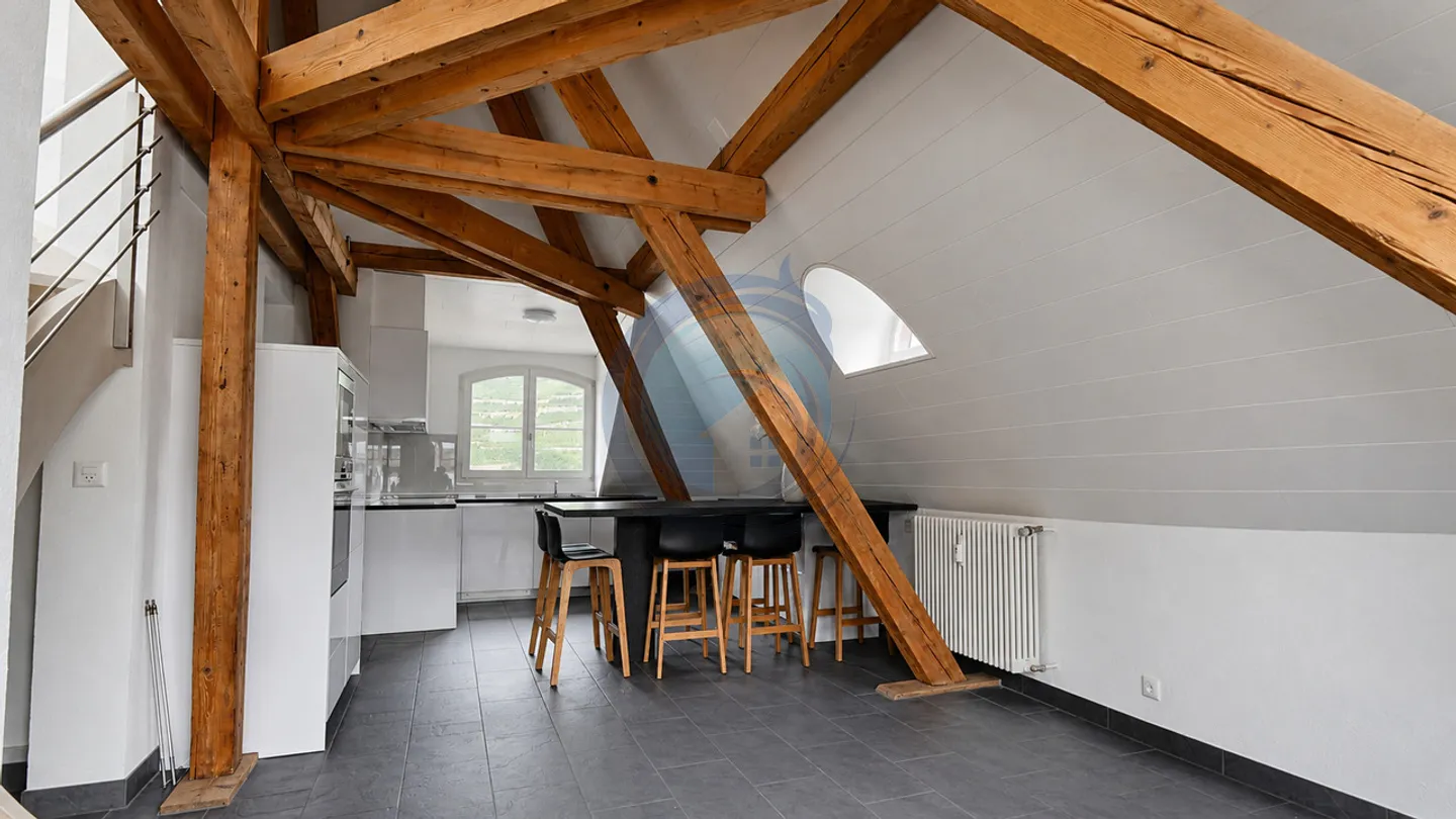 CHARMANT APPARTEMENT EN ATTIQUE DE 4.5 PIÈCES AU CENTRE-VILLE D'AIGLE - Photo 2 of 13