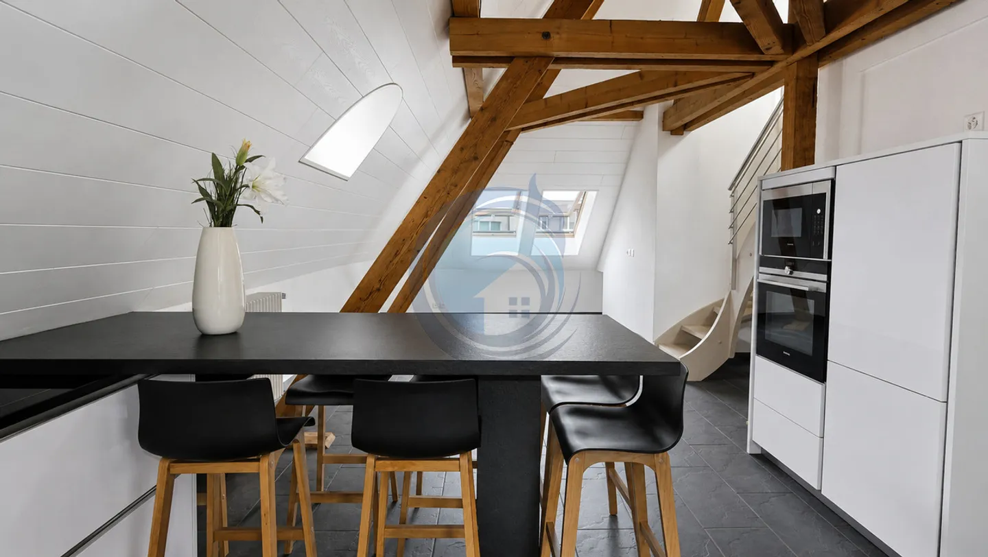 CHARMANT APPARTEMENT EN ATTIQUE DE 4.5 PIÈCES AU CENTRE-VILLE D'AIGLE - Photo 6 of 13