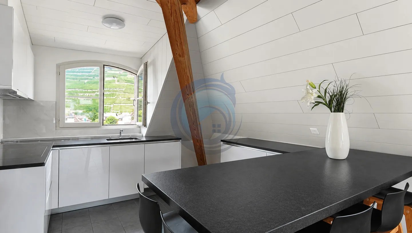 CHARMANT APPARTEMENT EN ATTIQUE DE 4.5 PIÈCES AU CENTRE-VILLE D'AIGLE - Photo 7 of 13