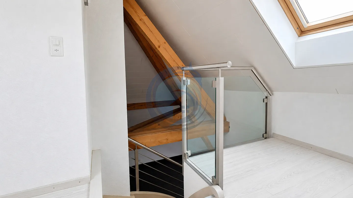 CHARMANT APPARTEMENT EN ATTIQUE DE 4.5 PIÈCES AU CENTRE-VILLE D'AIGLE - Photo 8 of 13
