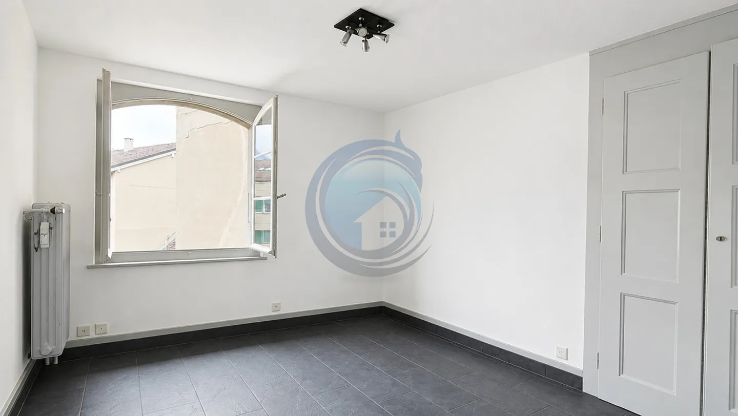 CHARMANT APPARTEMENT EN ATTIQUE DE 4.5 PIÈCES AU CENTRE-VILLE D'AIGLE - Photo 10 of 13