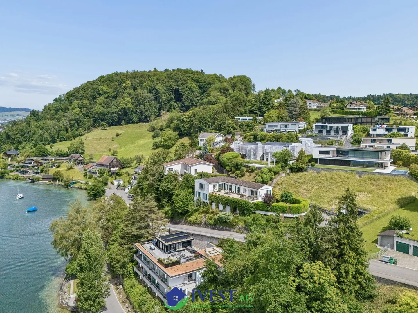 Exclusive Family Home with Lake View - Photo 1 of 39