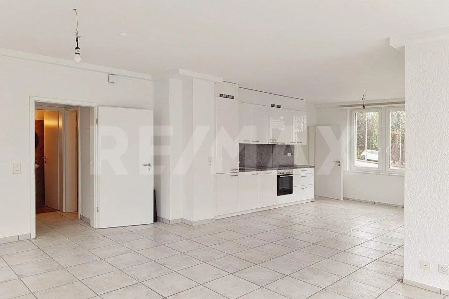 Maison multifamiliale avec 3 appartements attrayants - Photo 4 sur 10