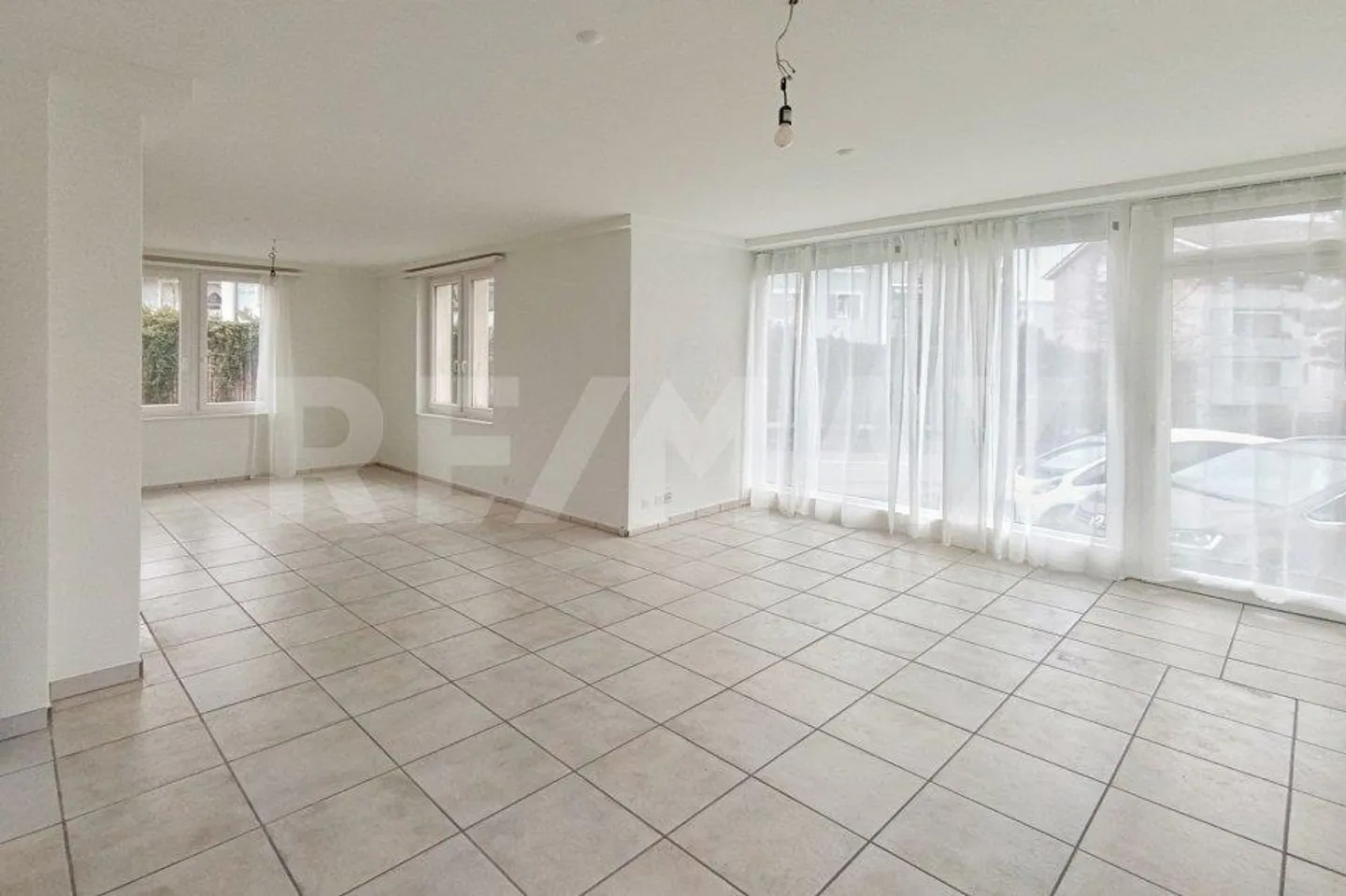 Maison multifamiliale avec 3 appartements attrayants - Photo 5 sur 10