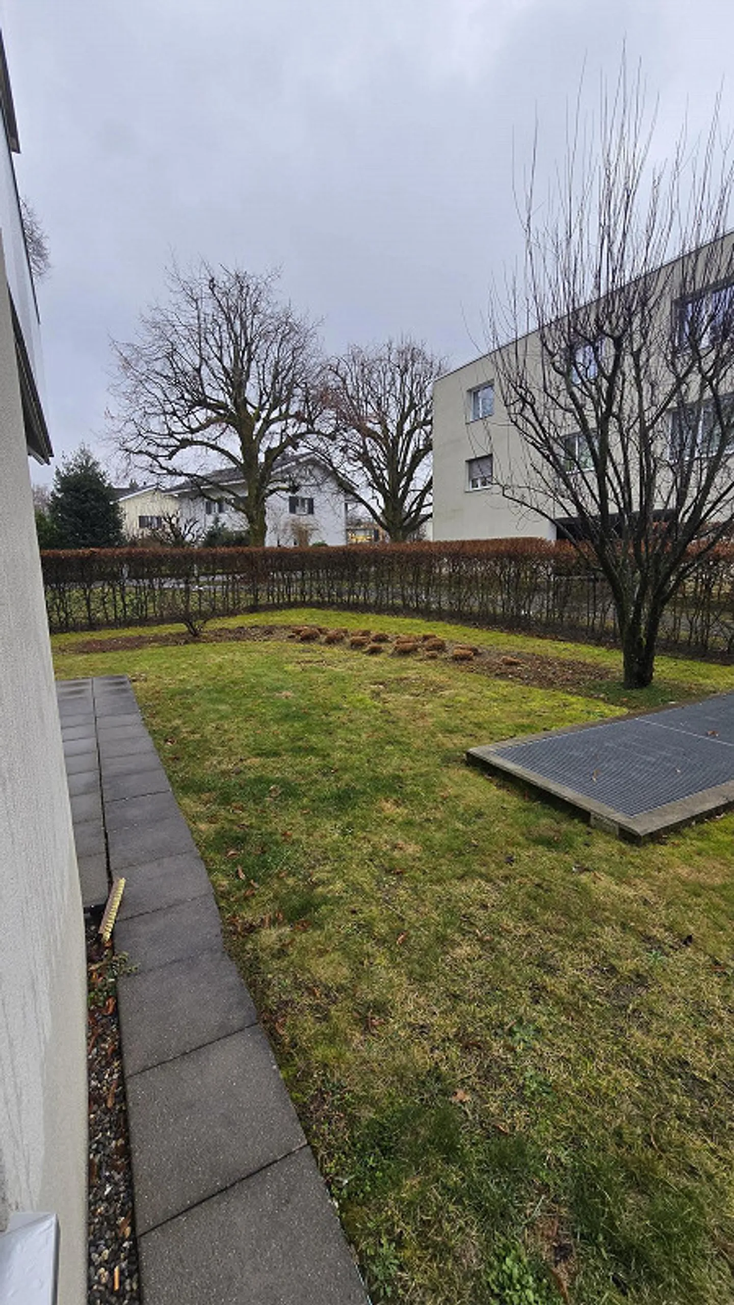 Appartement moderne de 3,5 pièces au rez-de-chaussée - Photo 18 sur 19