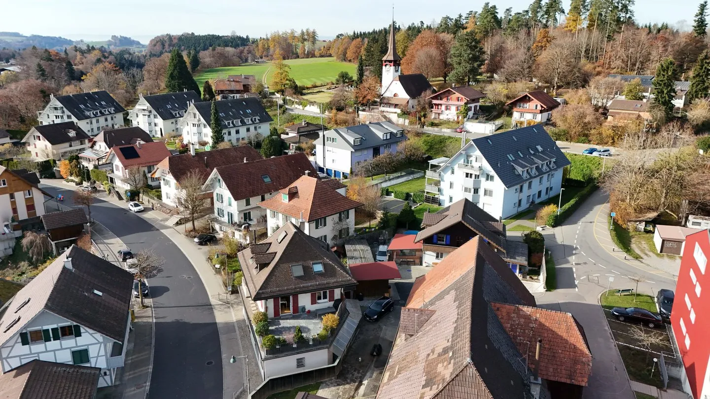 Residential and commercial building, village center Niederscherli - Photo 23 of 24