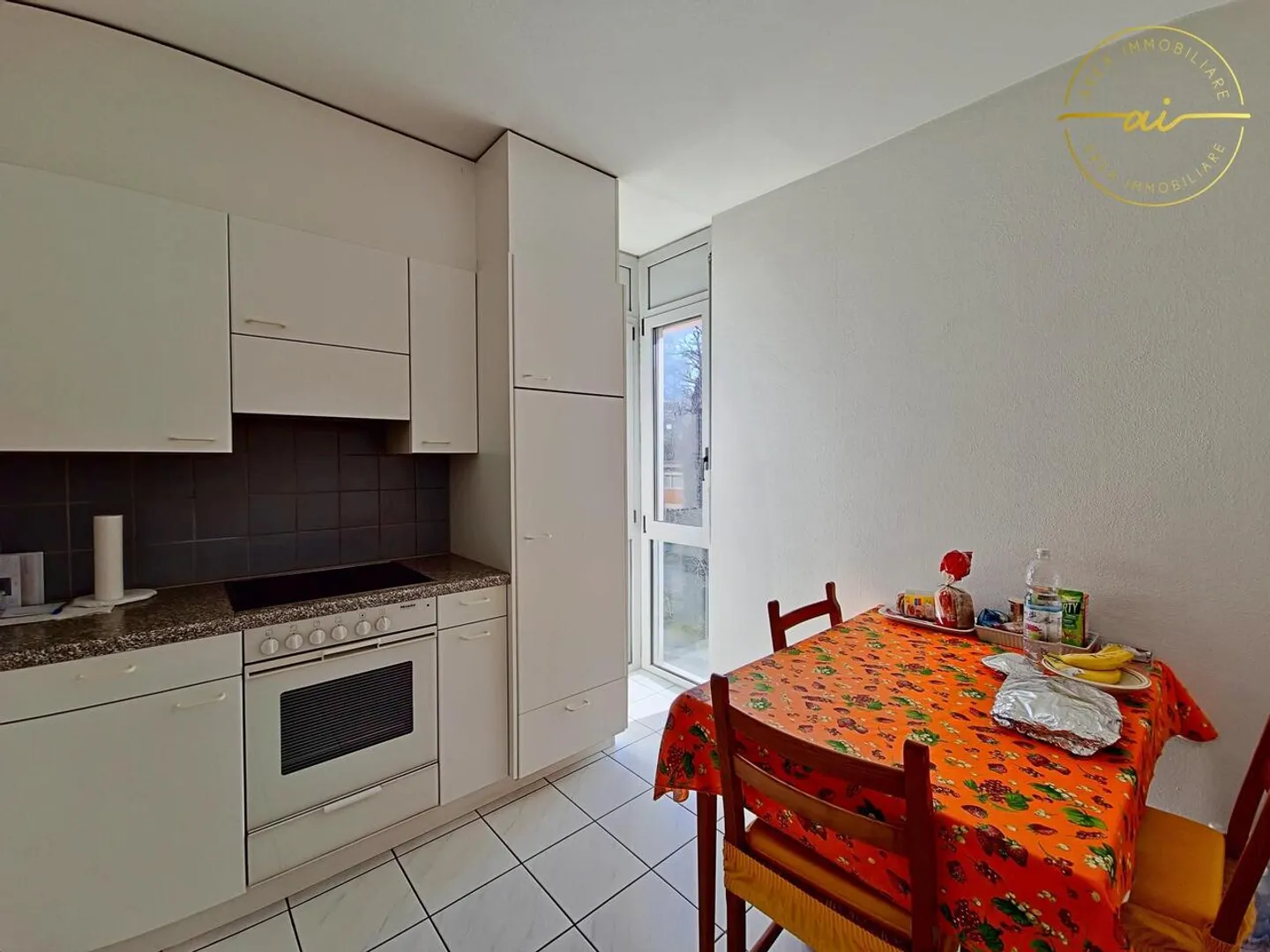 APPARTEMENT 4.5 PIÈCES AVEC TERRASSE ET VUE SUR LE LAC À MASSAGNO - Photo 5 sur 13