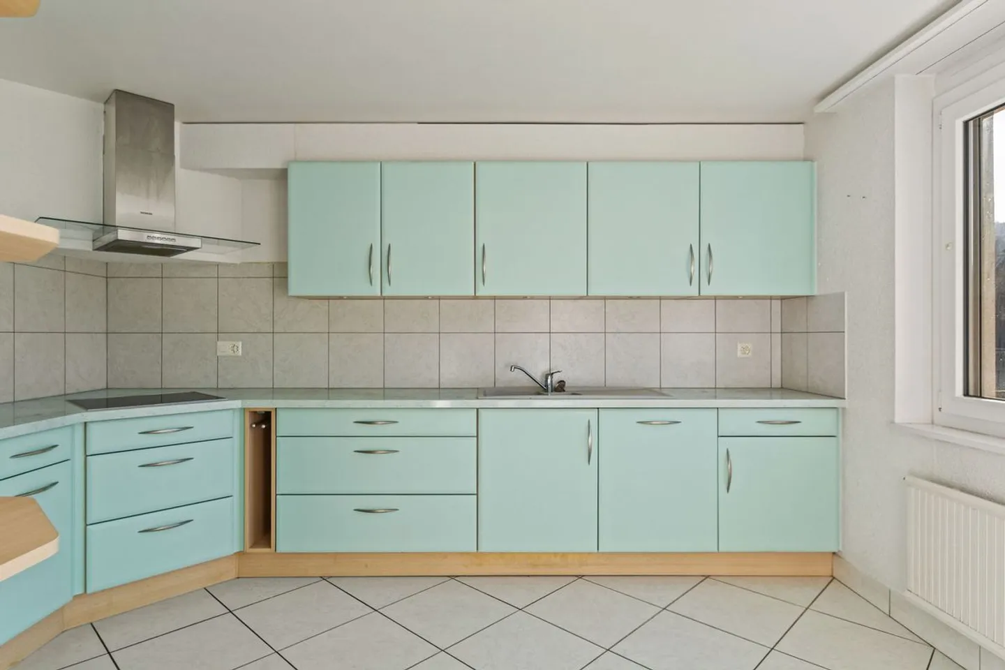 Charming and spacious 4.5-room apartment with balcony, communal garden, and 3 parking spaces - Photo 7 of 13