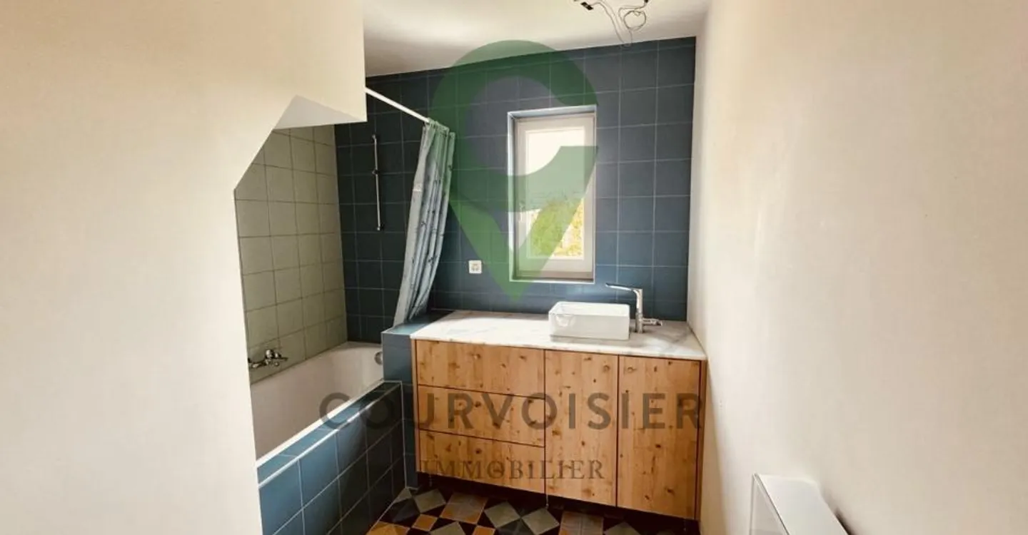 Maison de 5.5 pièces idéalement située à Yverdon - Photo 8 of 13