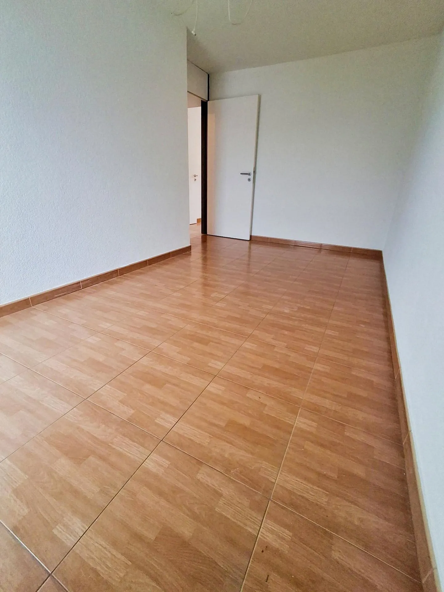 Spacious 4.5-room apartment with garage in Courroux - Photo 15 of 18