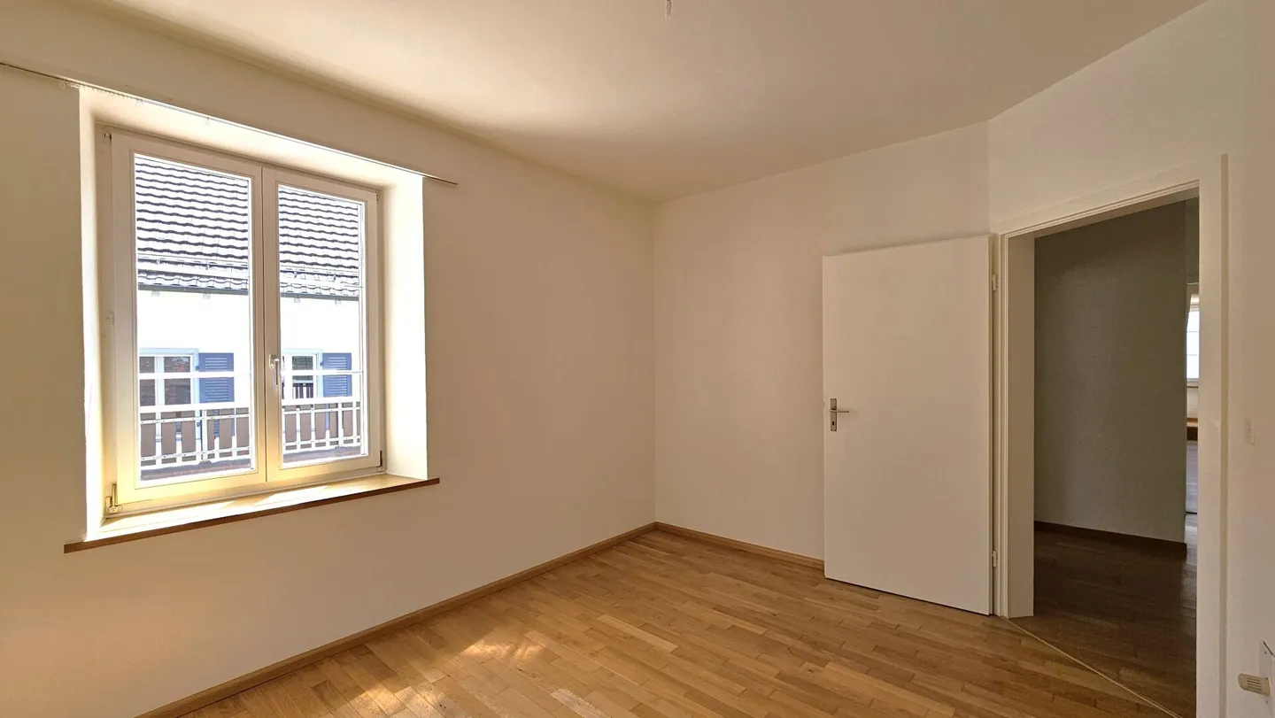 Heimelige Maisonettewohnung mit Terrasse und Garage - Foto 7 von 13