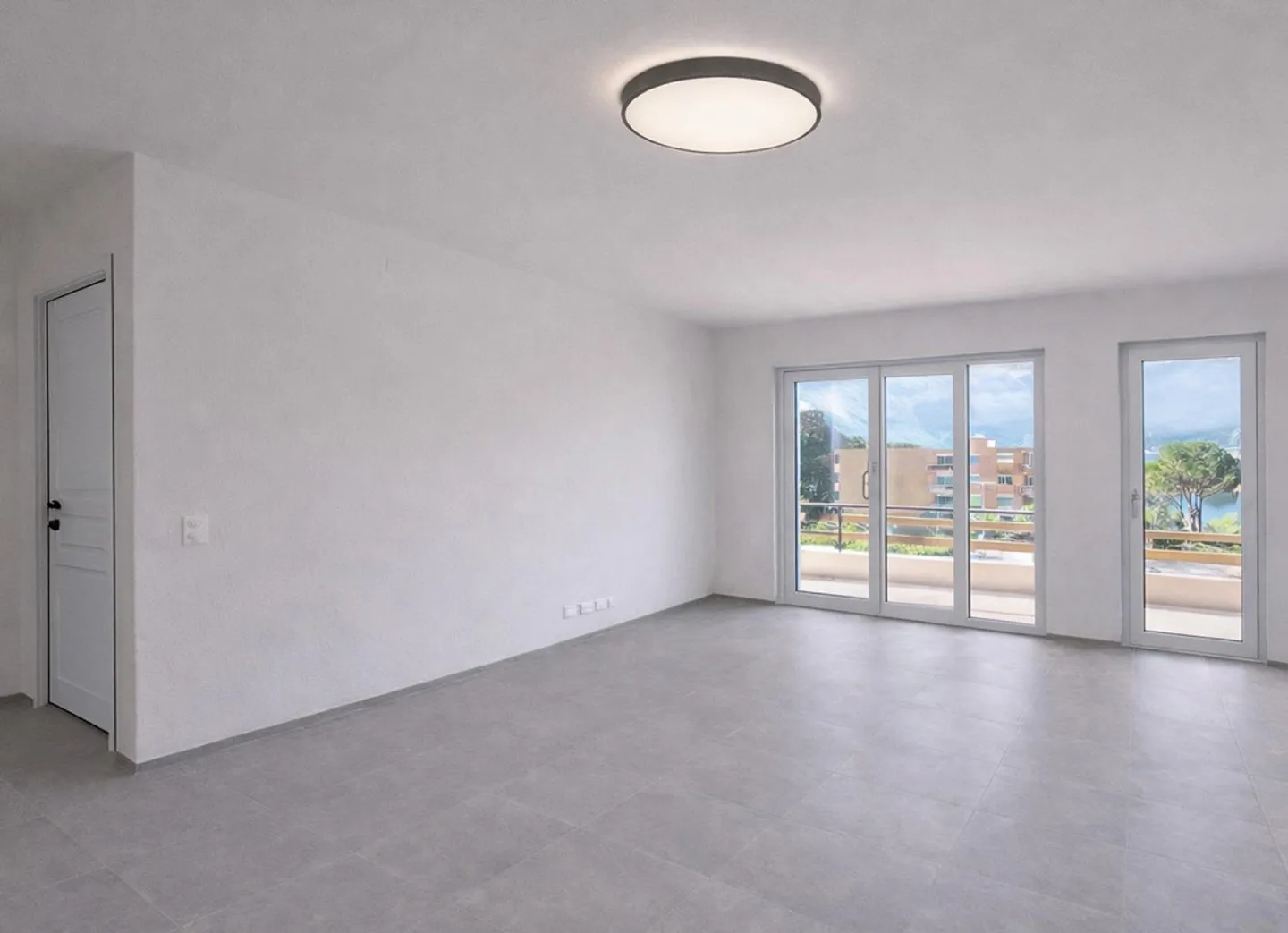 3,5-Zimmer-Wohnung mit teilweisem Seeblick in Melide - Foto 2 von 11