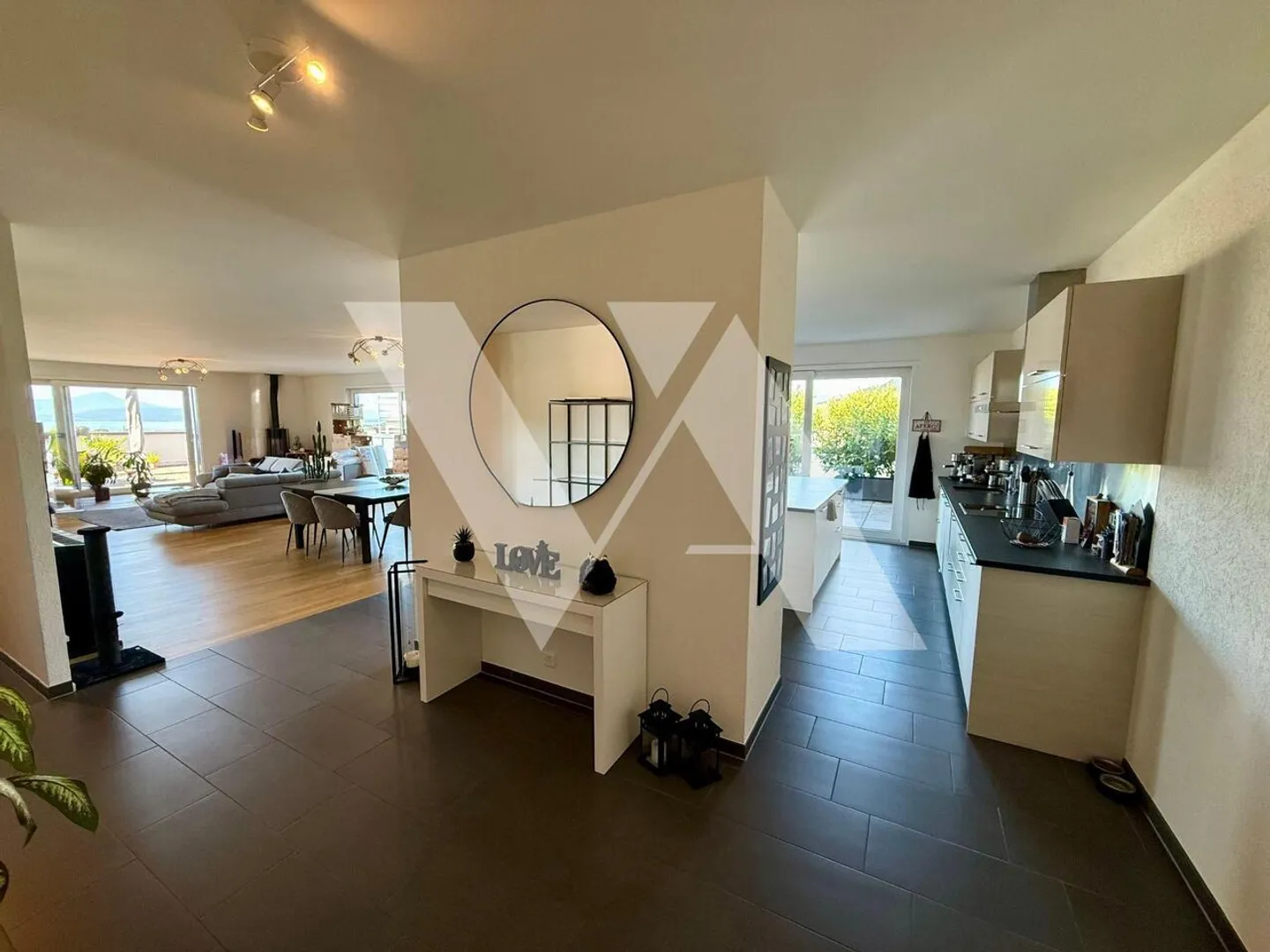 In vendita - Attico luminoso di 5,5 locali con grande terrazza e vista lago - Foto 3 di 7