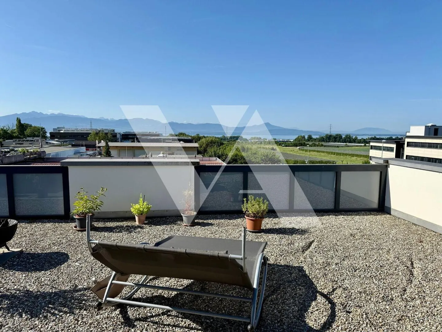 In vendita - Attico luminoso di 5,5 locali con grande terrazza e vista lago - Foto 5 di 7