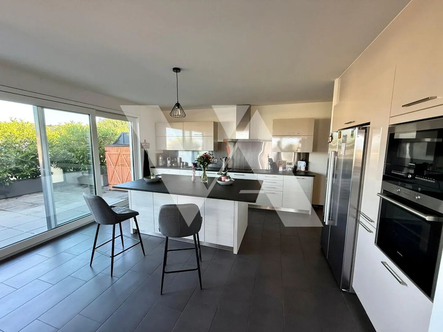 In vendita - Attico luminoso di 5,5 locali con grande terrazza e vista lago - Foto 6 di 7