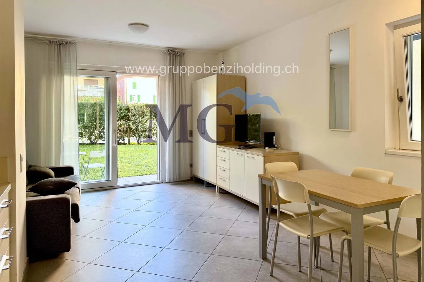 Appartement avec jardin, à quelques pas du lac de Lugano. - Photo 1 sur 20
