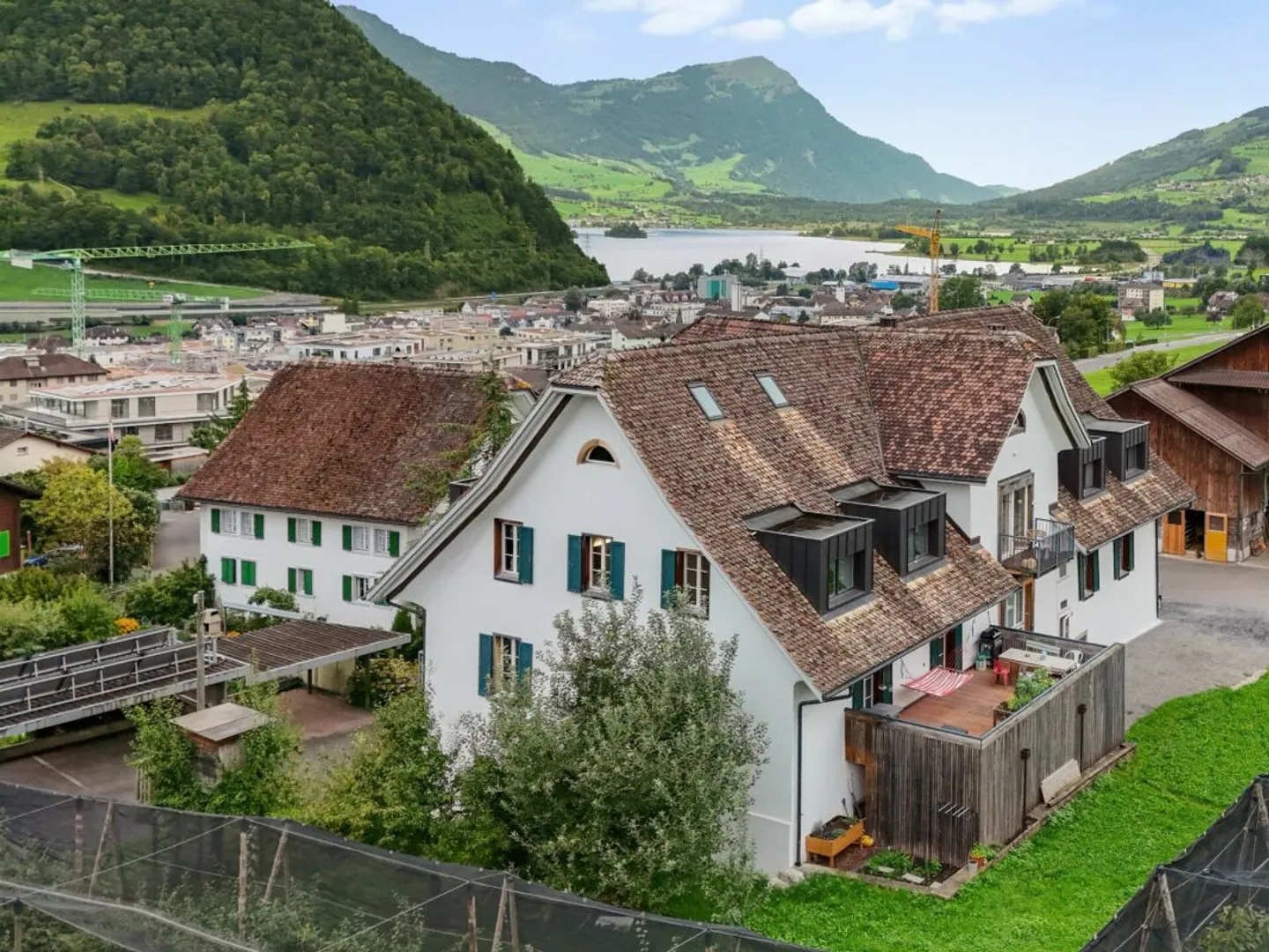 Stylish penthouse apartment with views of Mythen, lake and lush greenery - Photo 1 of 17