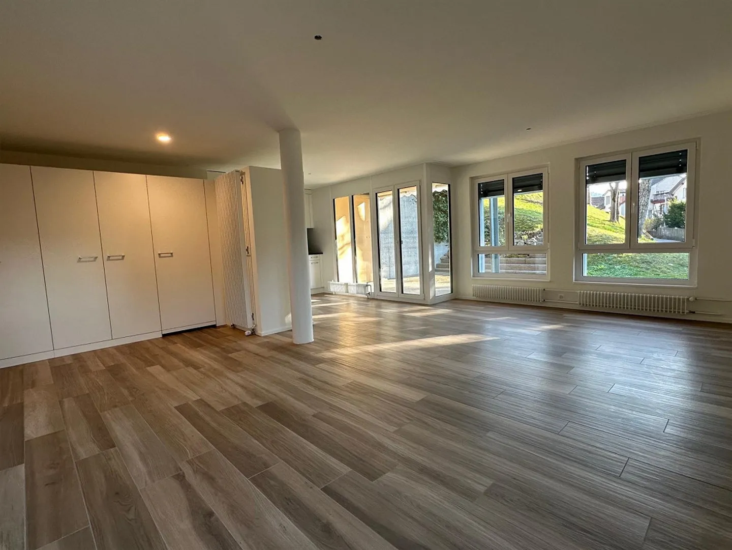 New, idyllic 5.5 room apartment with garden seating area - Photo 3 of 13