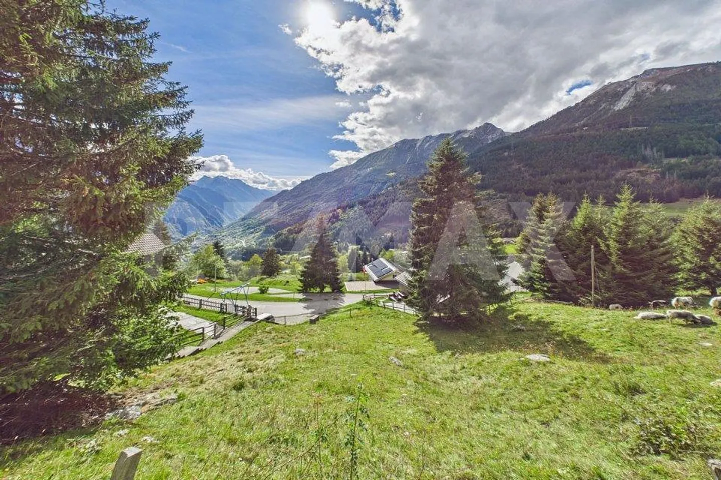 Grisons - Terrain constructible avec vue panoramique sur les montagnes - Photo 1 sur 13
