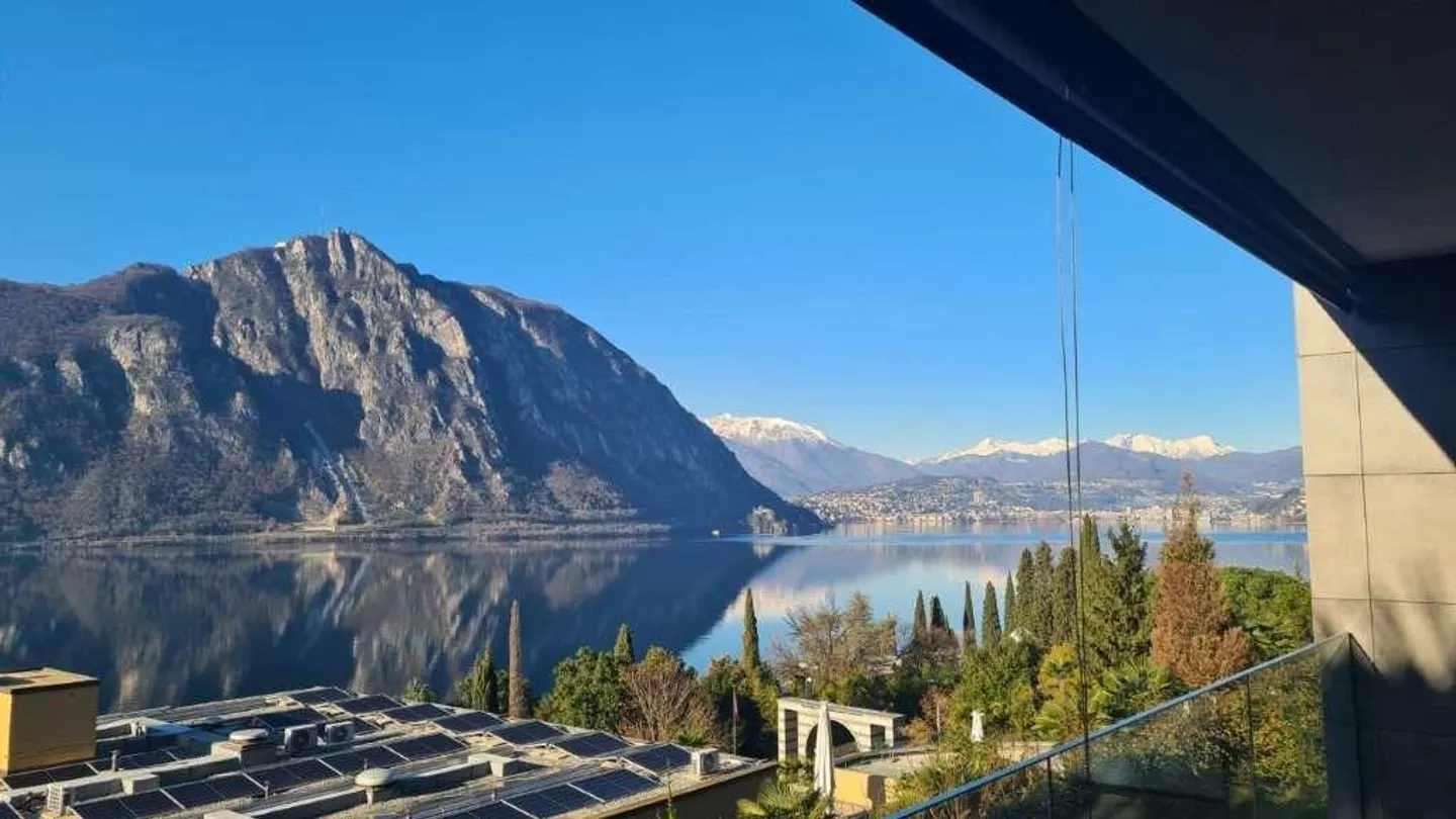 BISSONE: REFINED 2.5 ROOMS WITH LAKE VIEW - Photo 1 of 6