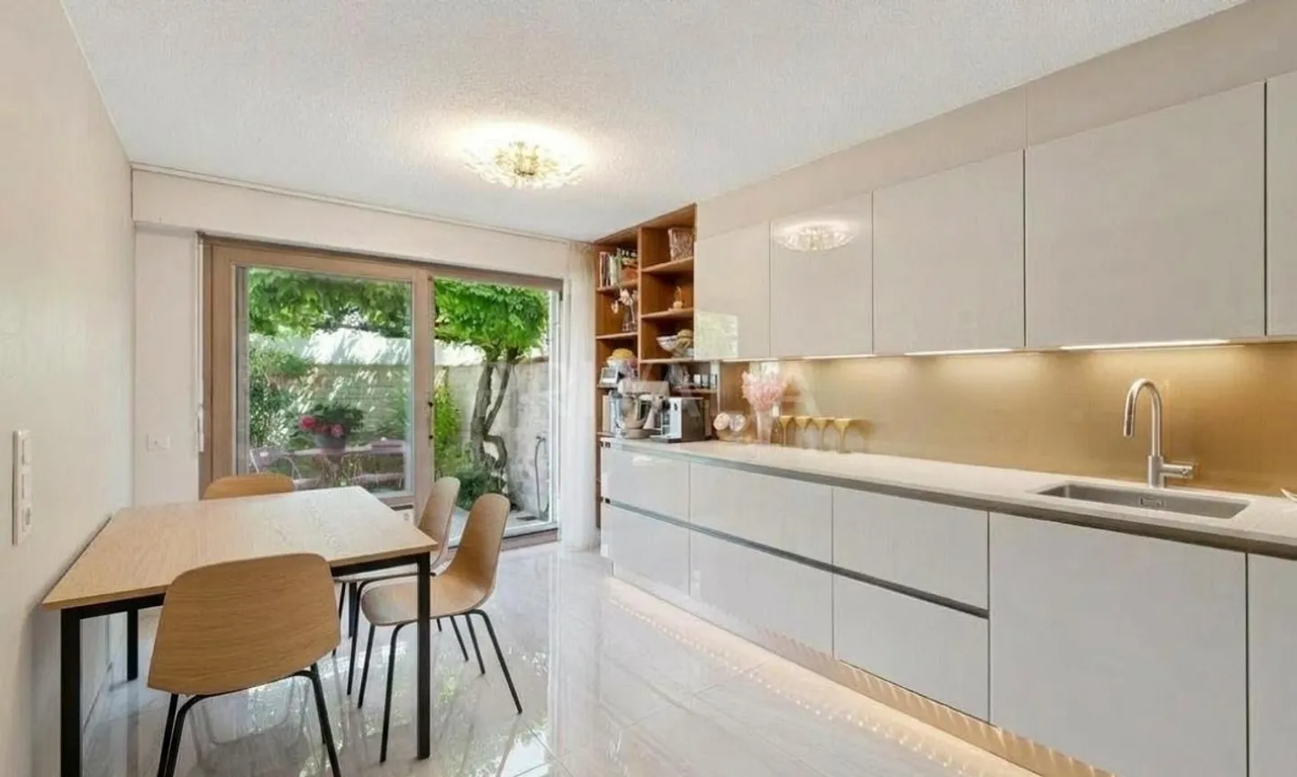 Charmante maison mitoyenne - Photo 3 sur 5