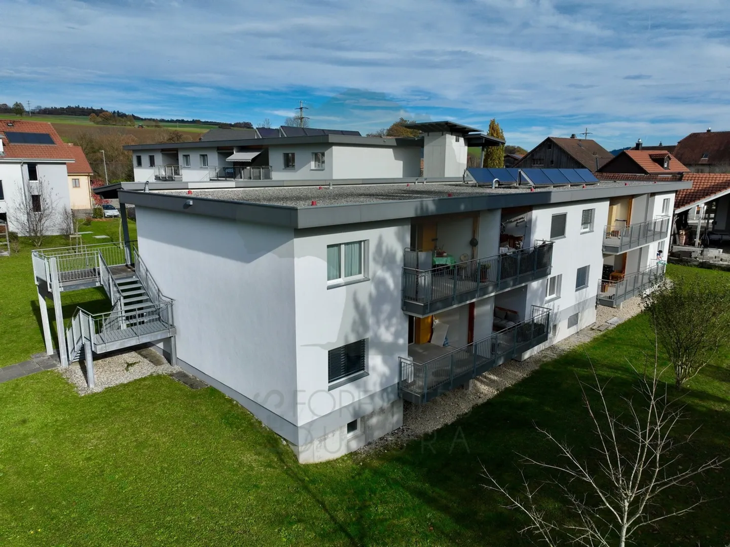 Minergie building with 8 apartments of 2.5 rooms with terraces - Photo 2 of 13