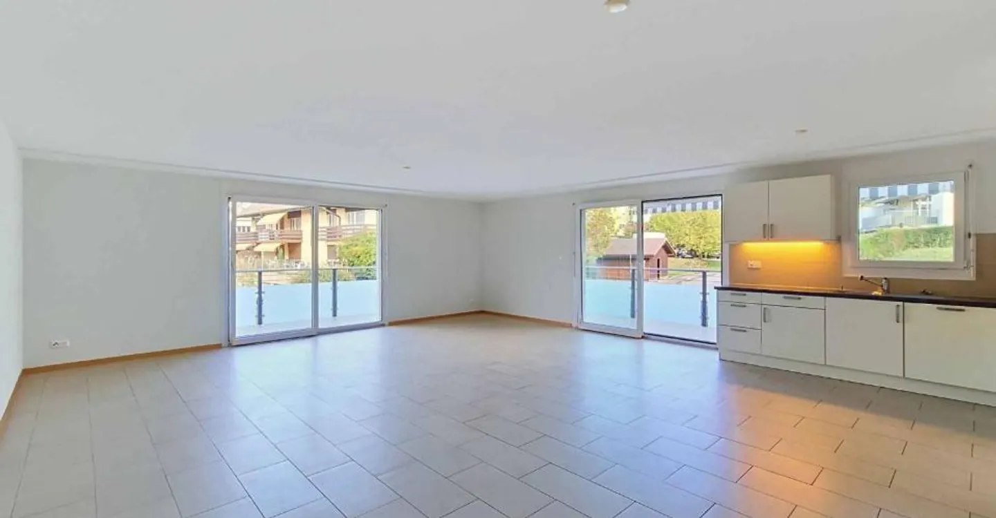 4.5 stanze con bei volumi e grande balcone - Foto 4 di 11