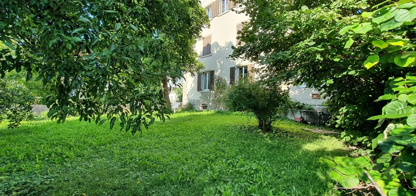 Charmant appartement mansardé avec terrasse dans un environnement verdoyant - Photo 3 sur 18