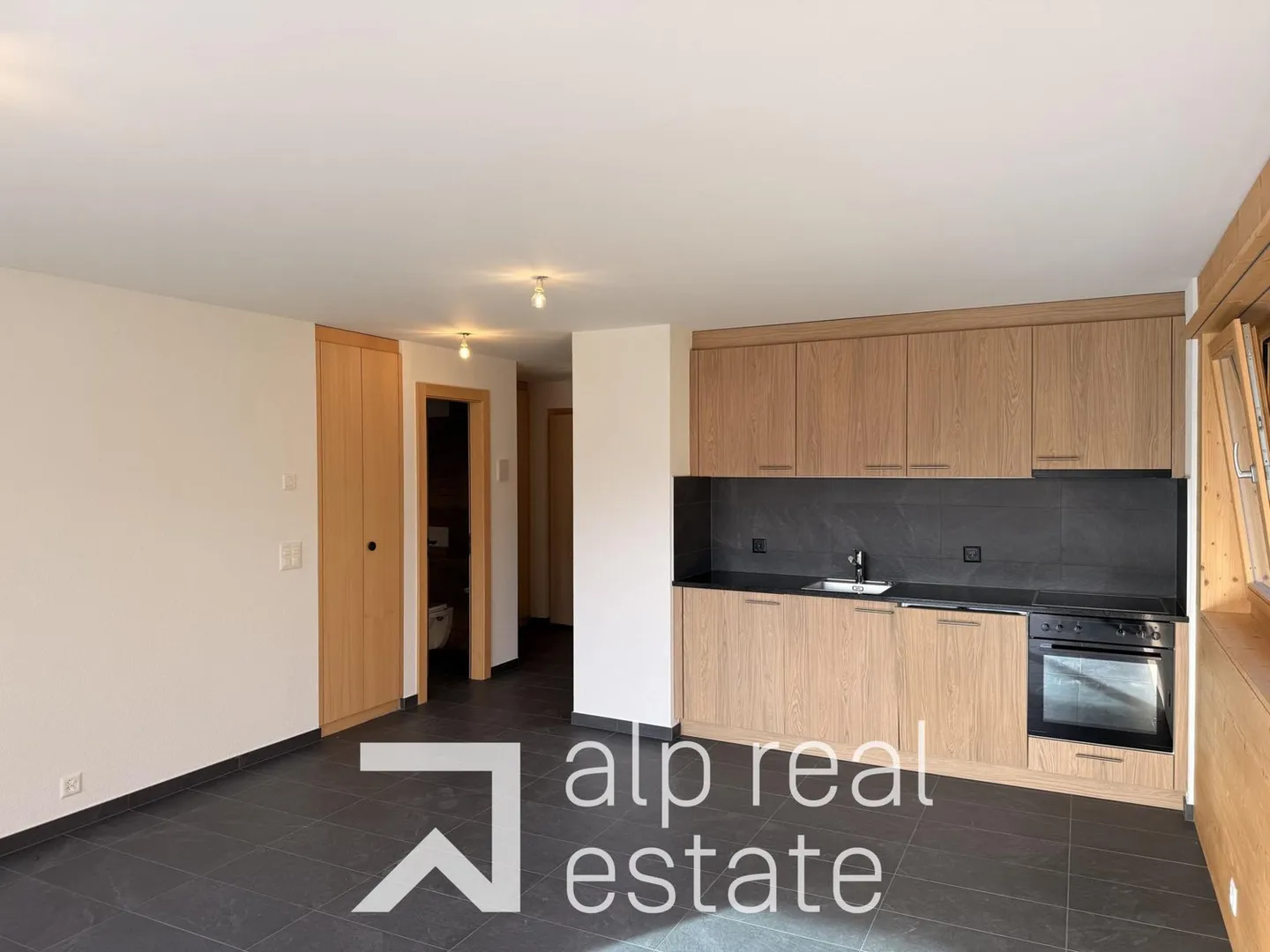 2,5 camere nuova costruzione con terrazza sud e vista montagna - Foto 5 di 13