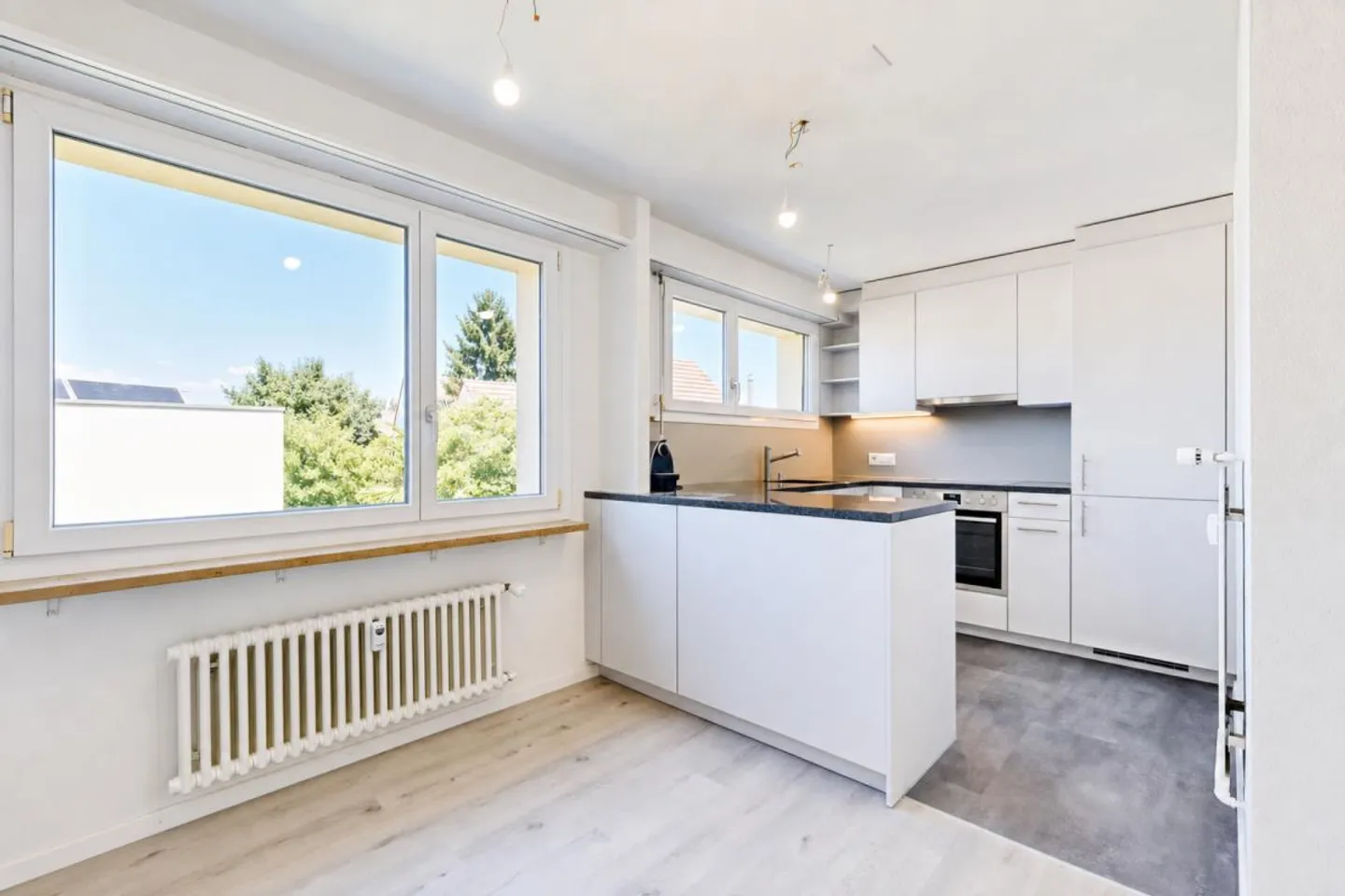 Appartamento moderno 3.5 locali con balcone, cantina, soffitta, lavatrice e posto auto - Foto 3 di 13