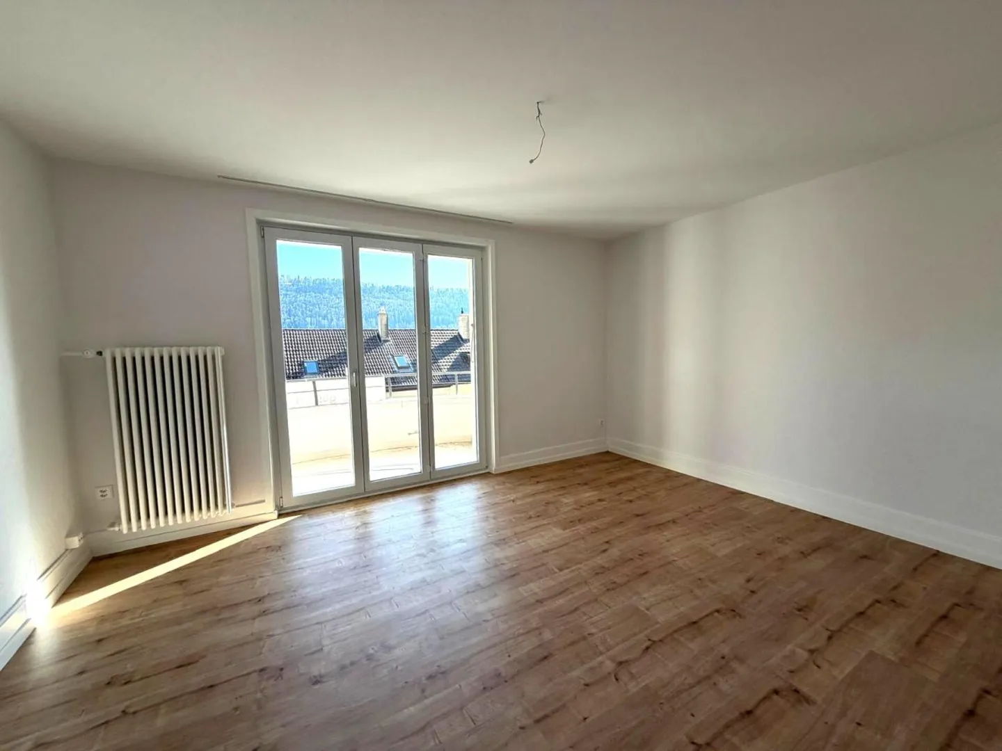 St-Imier, wunderschöne 3.5-Zimmer-Wohnung im 2. Stock mit Balkon - Foto 3 von 6