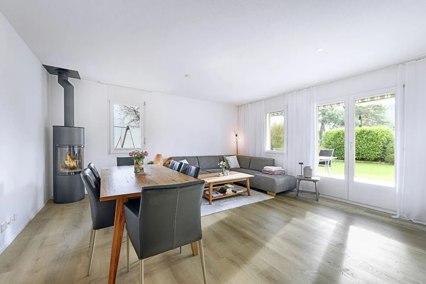 Appartamento giardino 4,5 locali con sala hobby e 2 posti auto nel garage sotterraneo - Foto 1 di 11