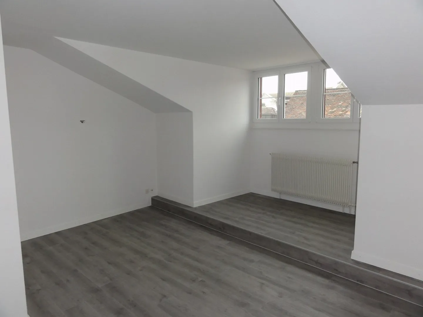 Appartamento mansardato nel centro città - Foto 1 di 9