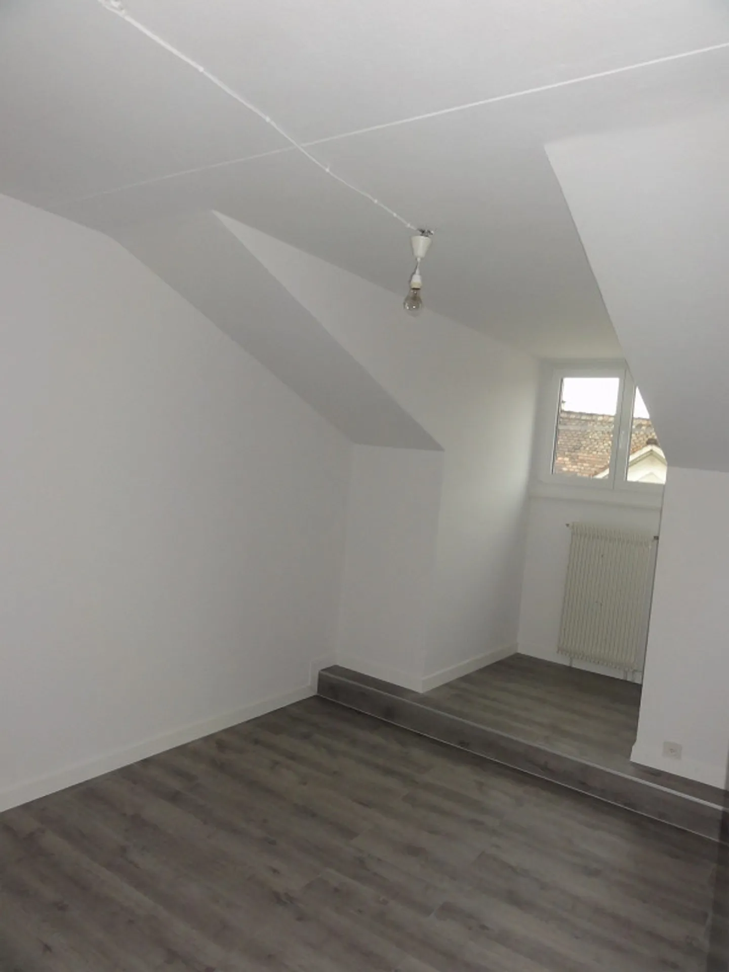 Appartamento mansardato nel centro città - Foto 4 di 9