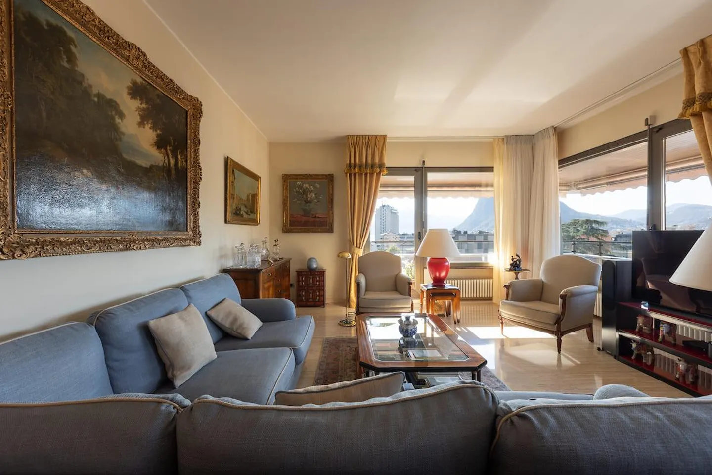 Penthouse élégant avec vue partielle sur le lac de Lugano - Photo 1 sur 10