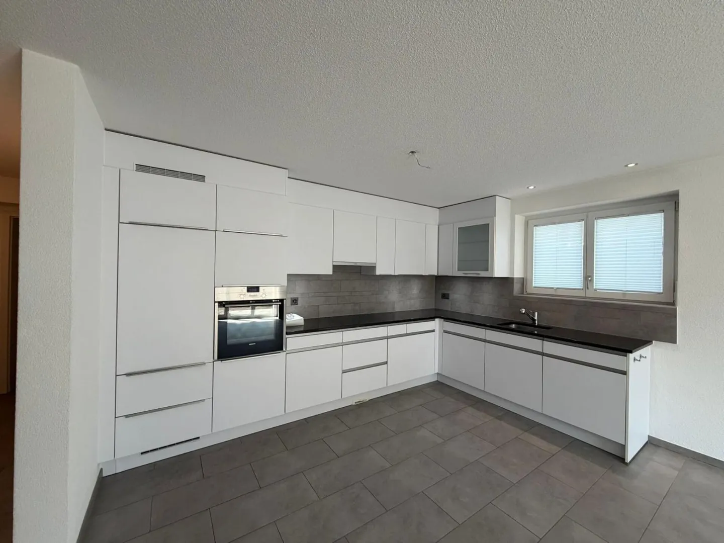 Modernes Erdgeschoss-Apartment - Foto 1 von 9