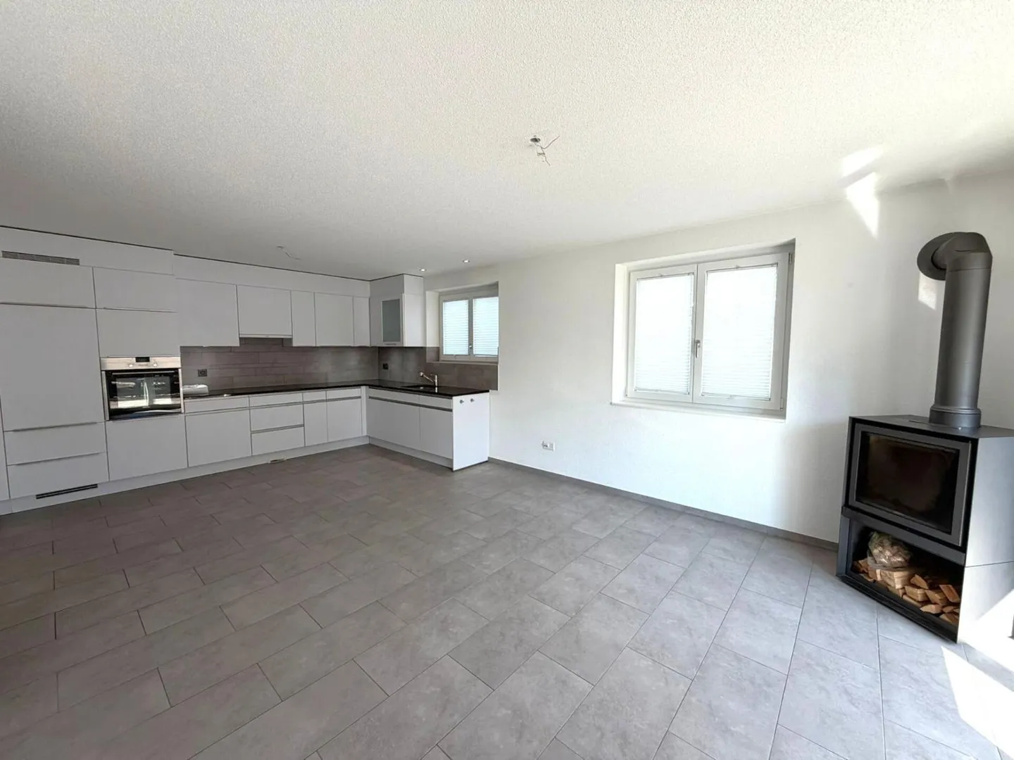 Modernes Erdgeschoss-Apartment - Foto 2 von 9