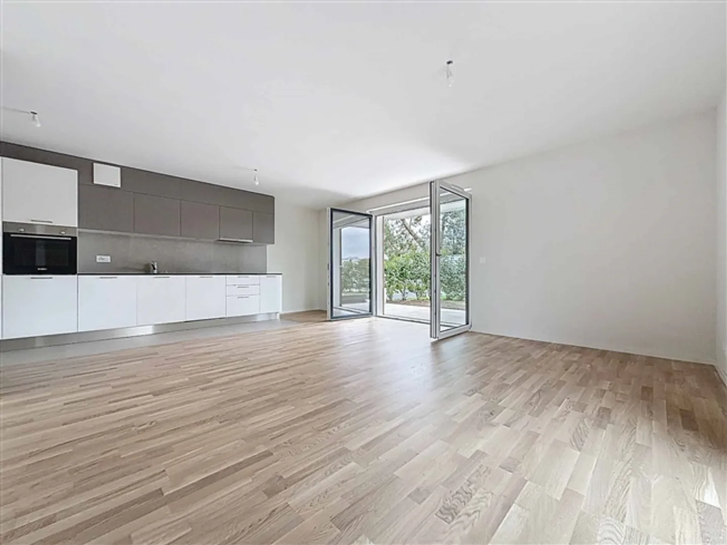 Nouvel appartement de 3,5 pièces avec terrasse et jardin - Photo 1 sur 13