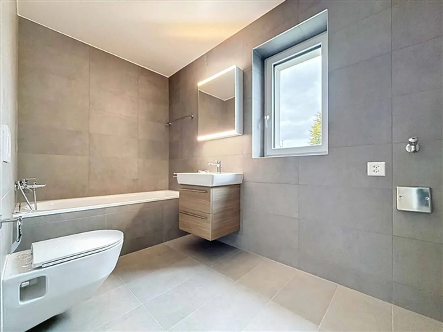 Nouvel appartement de 3,5 pièces avec terrasse et jardin - Photo 5 sur 13