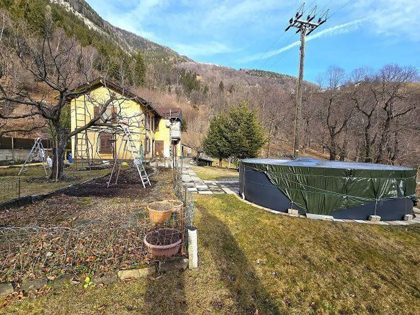 Maison 5 1/2 pièces en emplacement isolé avec beau jardin - Photo 35 sur 38
